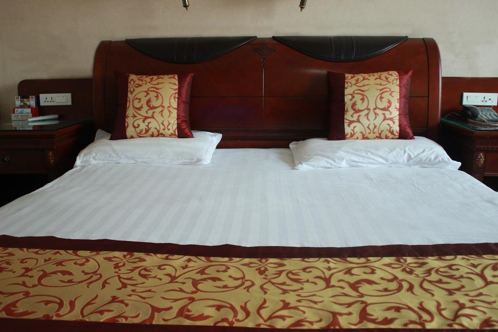 Taizhou Taishan Business Hotel Habitación foto